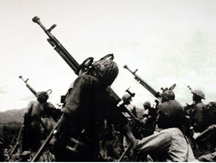 Vietnam People's Army soldiers manning 12.7mm anti-aircraft machine guns to engage the French air force.