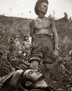 Exhausted French soldiers resting in the brush.
